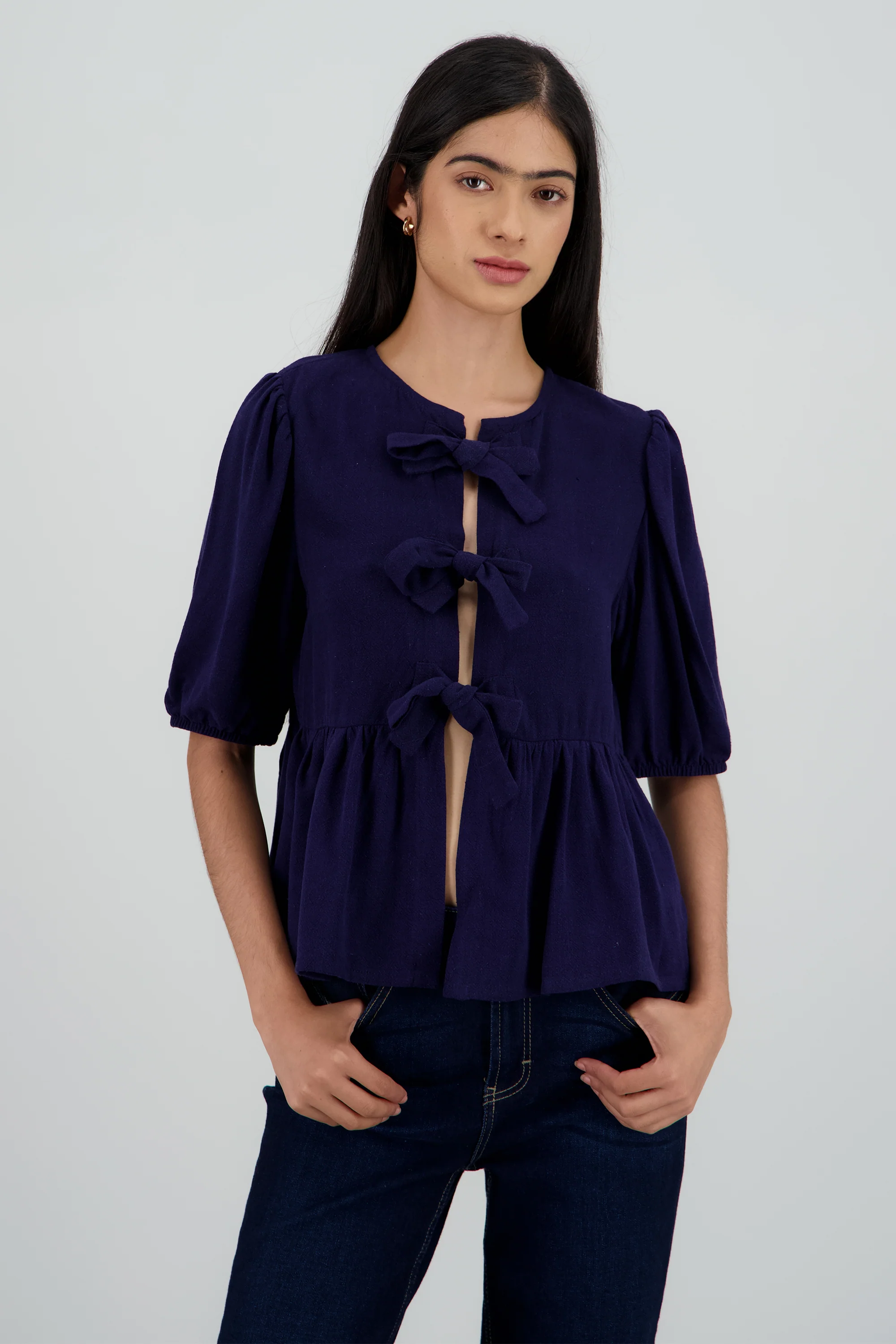 Blusa manga abullonada con moños