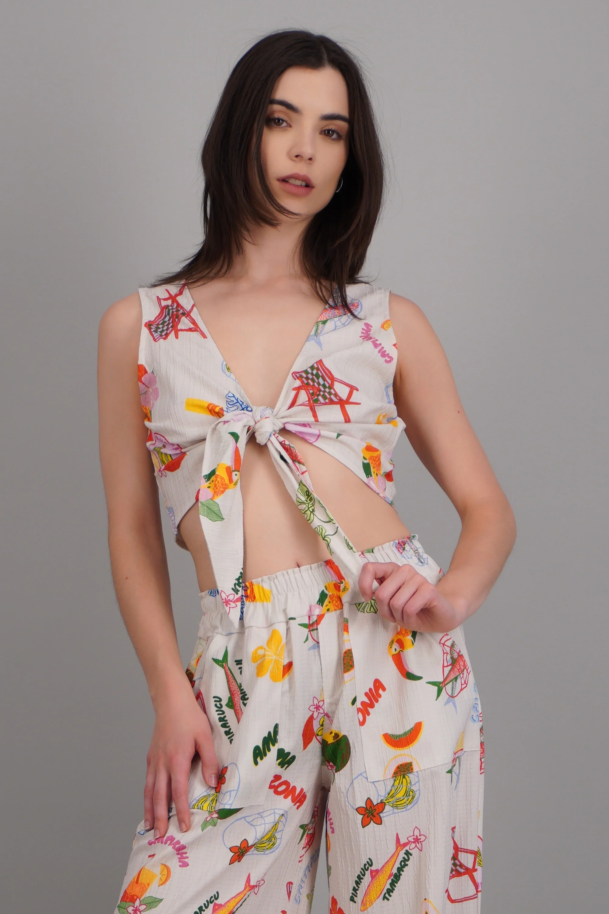 Blusa nudo estampado playa