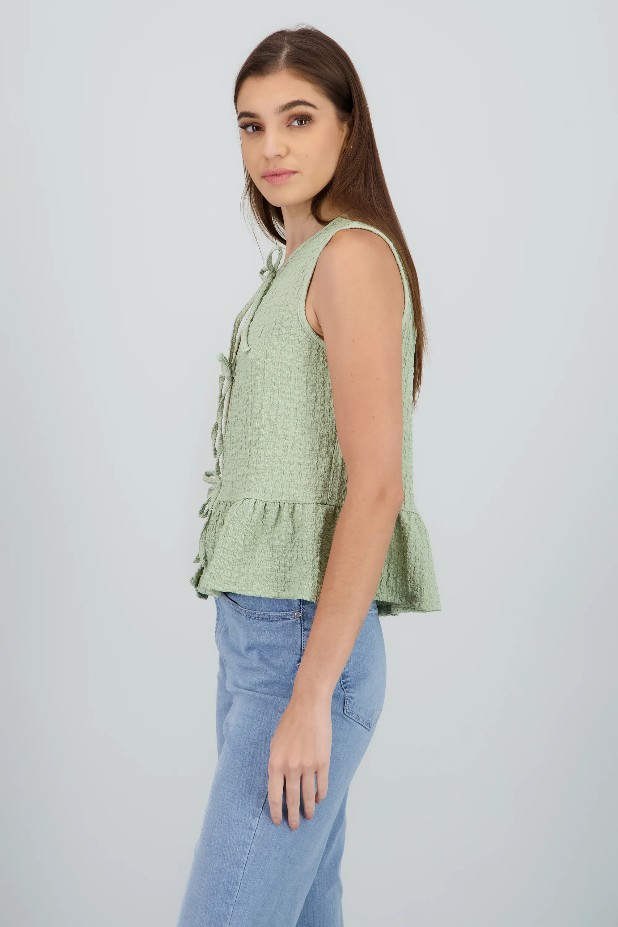 Blusa sin manga con olan y moños - Image 3