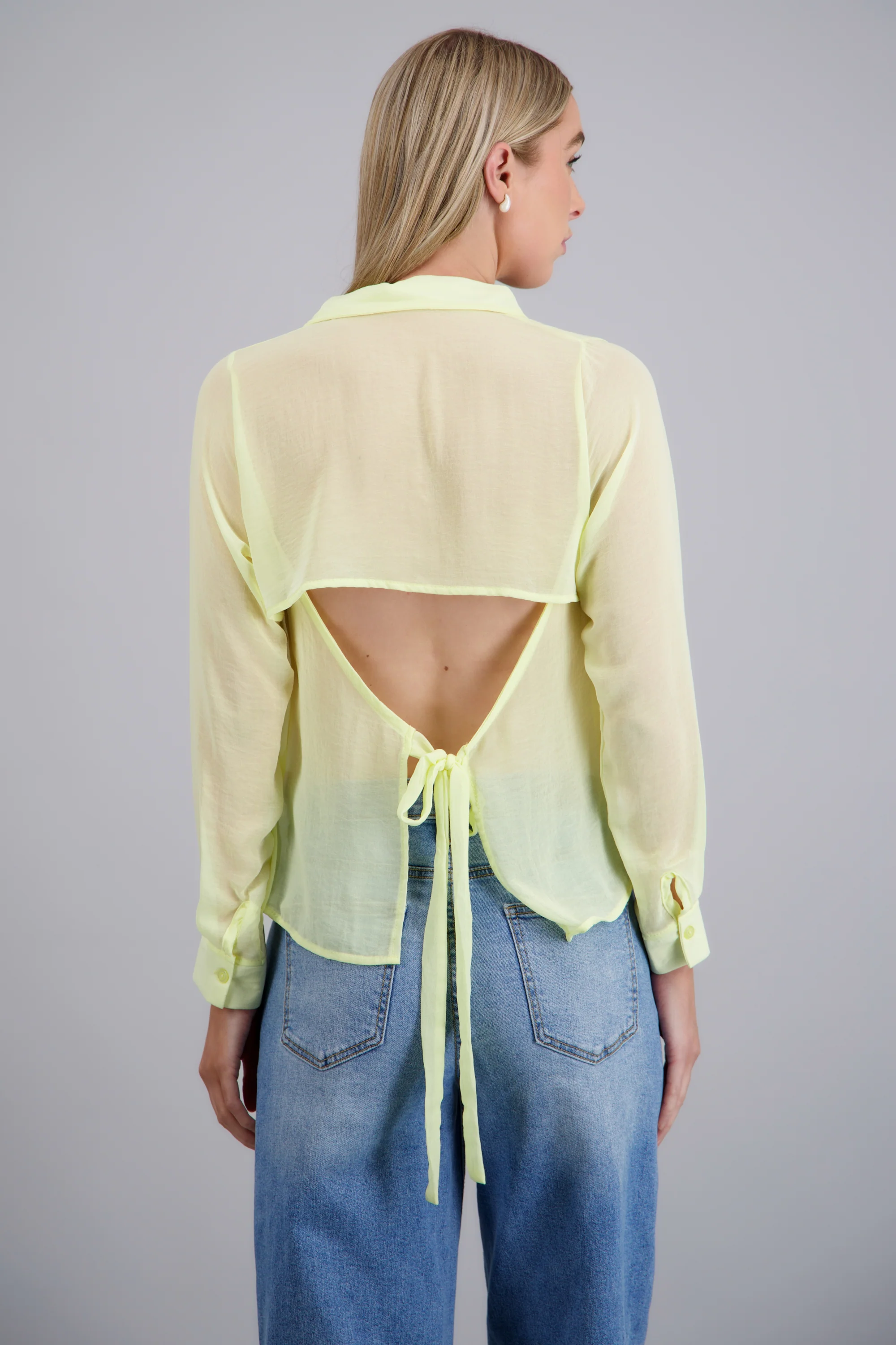 Blusa vaporosa detalle moño