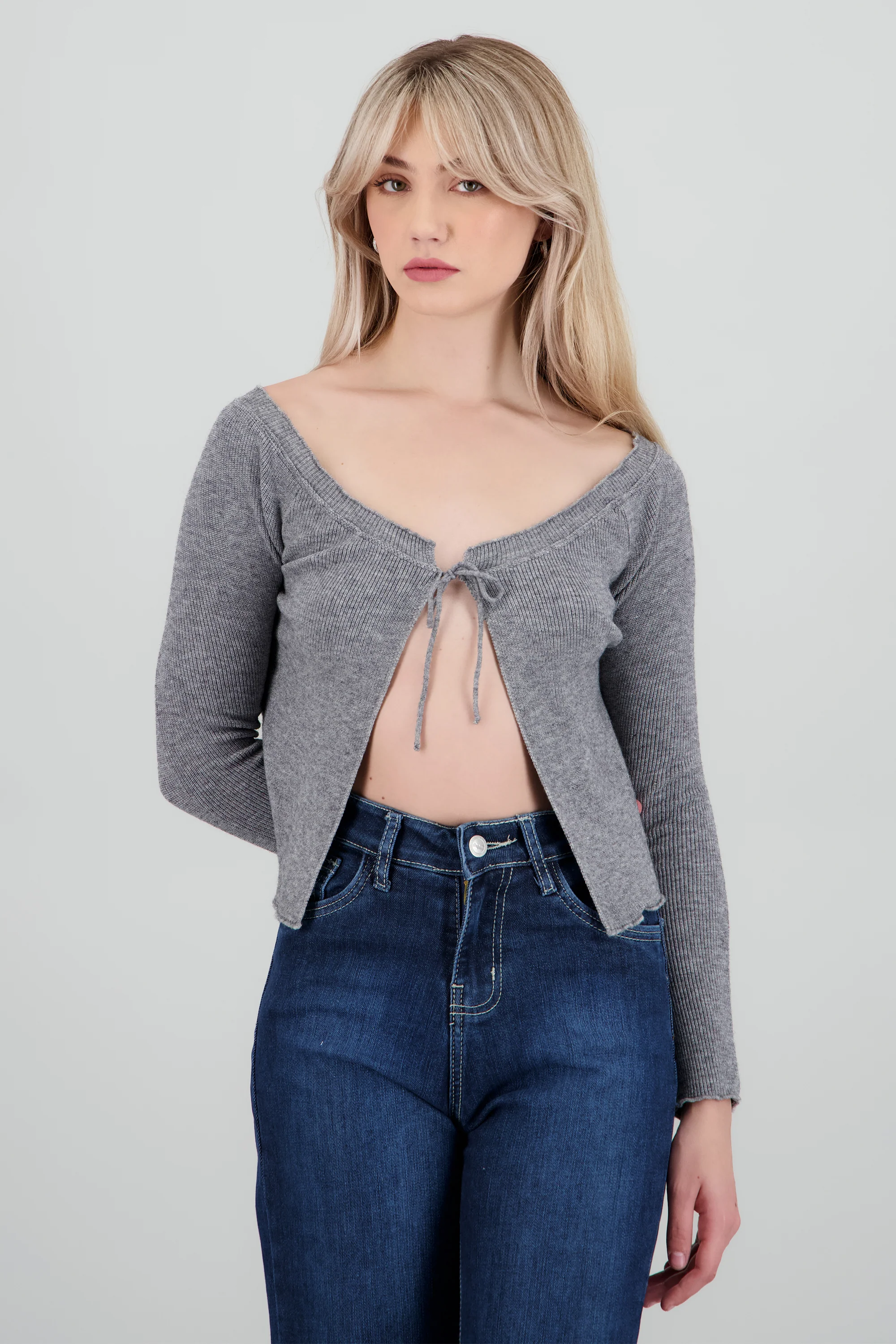 Cardigan off shoulder detalle moño