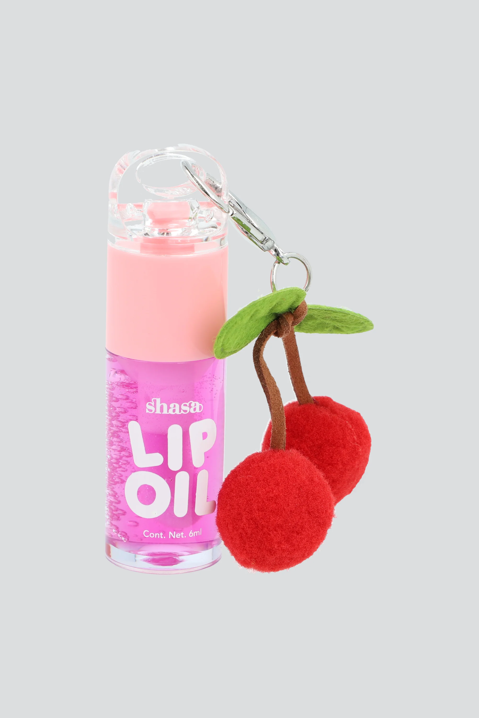 Lip oil charm cerezas pompon