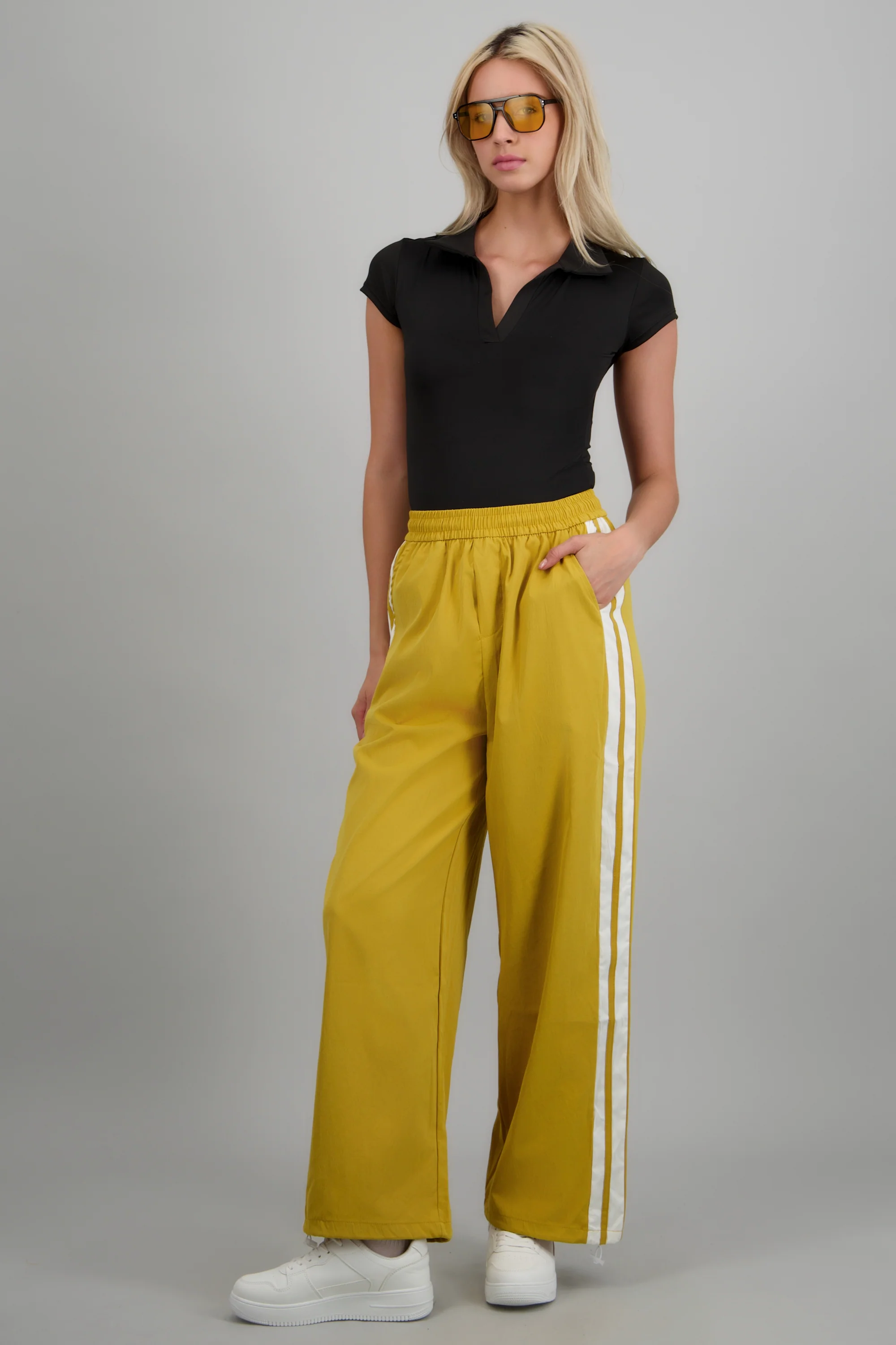 Pantalon rayas en costados