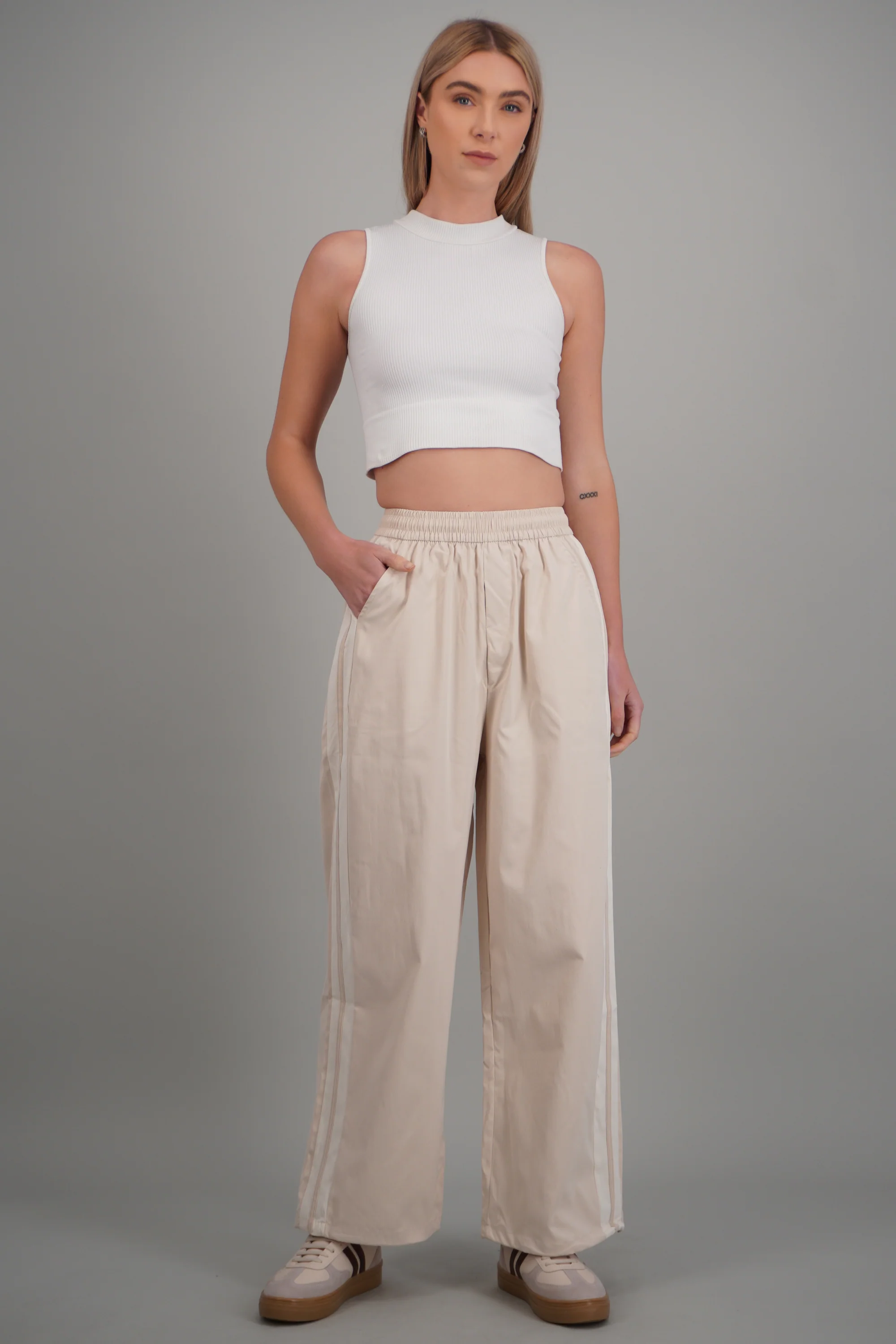 Pantalon rayas en costados